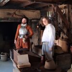 Two actors at Jamestown fort.